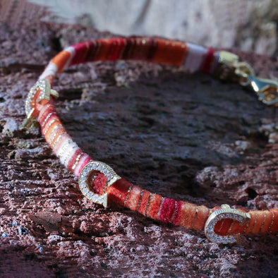 superstitiously-lucky-horseshoe-orange-cotton-silver-wave-bracelet