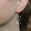 smelly-sleepy-swinging-cat-silver-dangly-earrings-1