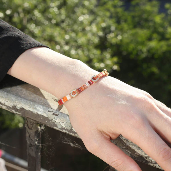 superstitiously-lucky-horseshoe-orange-cotton-silver-wave-bracelet-1